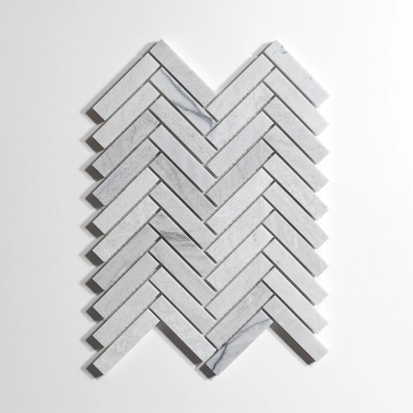 gris_surro_herringbone_1_X_4_11X15SHEET_Honed